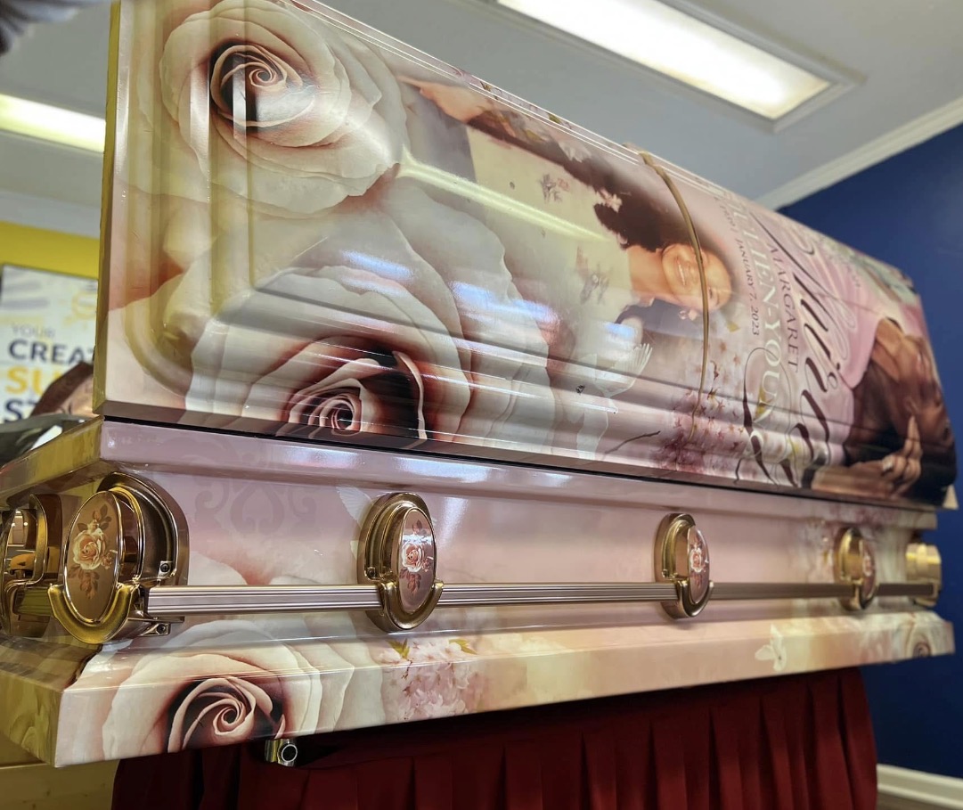 Close detail of blush rose casket wrap and hardware